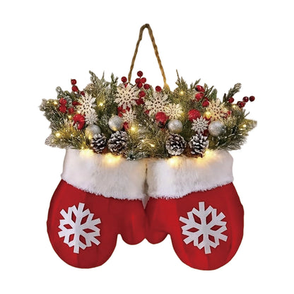 Glove-shaped Christmas garland wreath with greenery, pine cones, berries, snowflakes and warm lights for door or window decor.