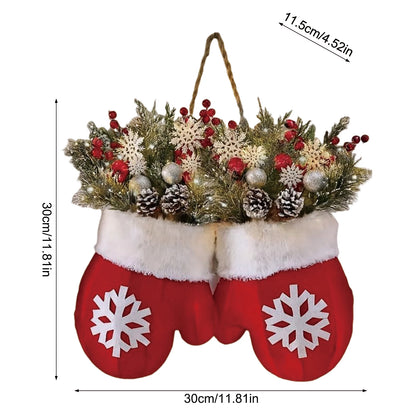 Glove-shaped Christmas garland wreath with greenery, pinecones, red berries, and snowflake mittens for door or window.