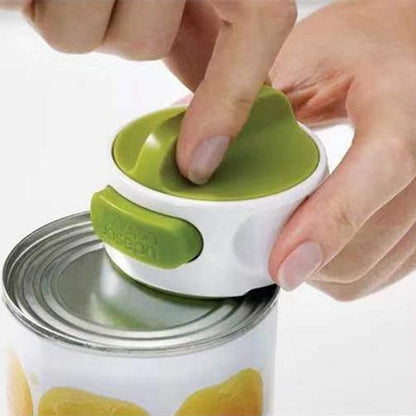 Stainless steel bottle opener gadget in green and white, a compact labor-saving tool for quick bottle openings.